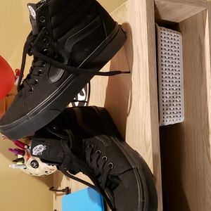 All Black high top vans